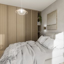 PoKa Design - Jasna sypialnia z dużą, drewnianą szafą w zabudowie, designerską lampą wiszącą i minimalistycznym obrazem na ścianie. Przytulne wnętrze z elementami dekoracyjnymi.