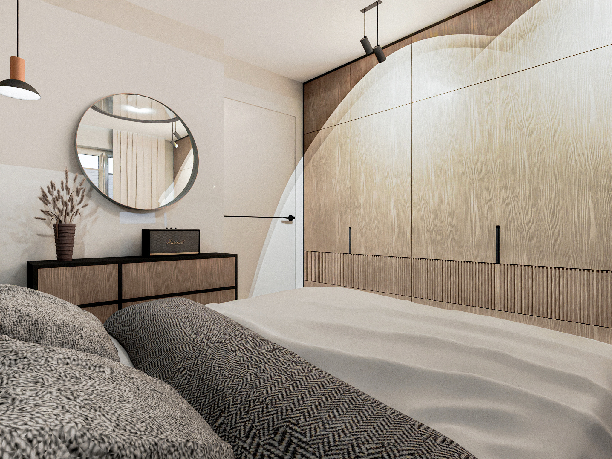 Nowoczesna sypialnia z dużym łóżkiem, szafą z jasnego drewna i okrągłym lustrem. Uwagę zwraca minimalistyczny design i stonowana kolorystyka wnętrza.