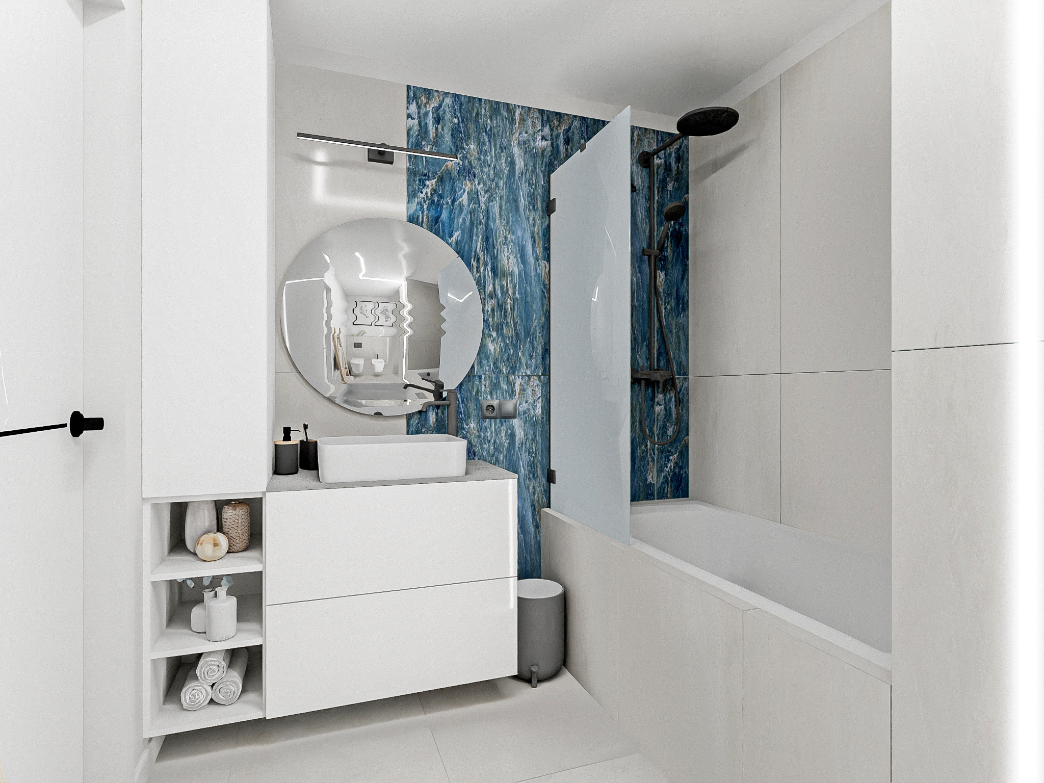 Nowoczesna łazienka z białą szafką pod umywalkę, okrągłym lustrem i niebieską mozaiką nad wanną. Minimalistyczny design z akcentem kolorystycznym.