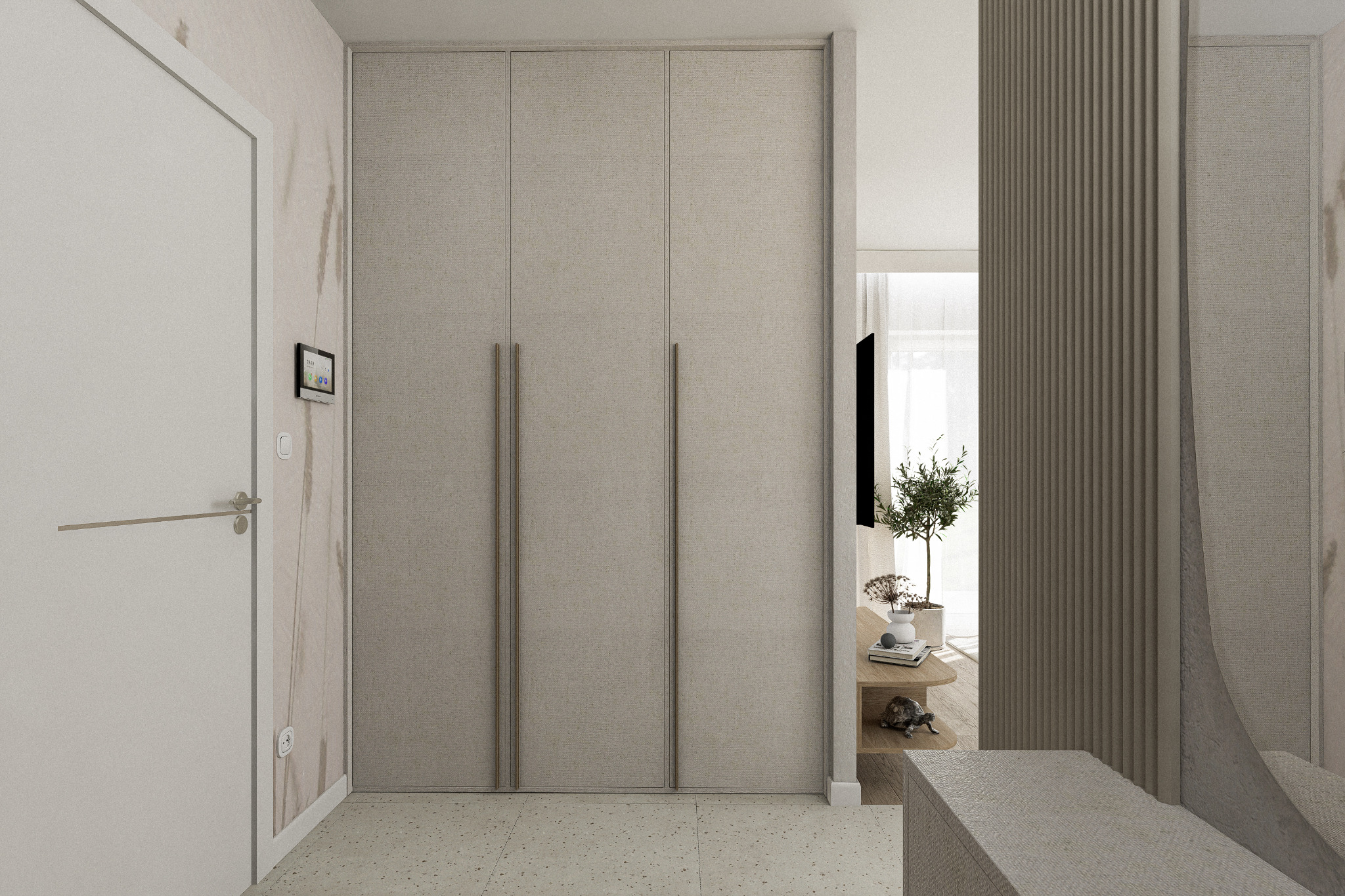 Beżowa szafa wnękowa z długimi, pionowymi uchwytami, wkomponowana w nowoczesne wnętrze z elementami dekoracyjnymi i jasną podłogą.