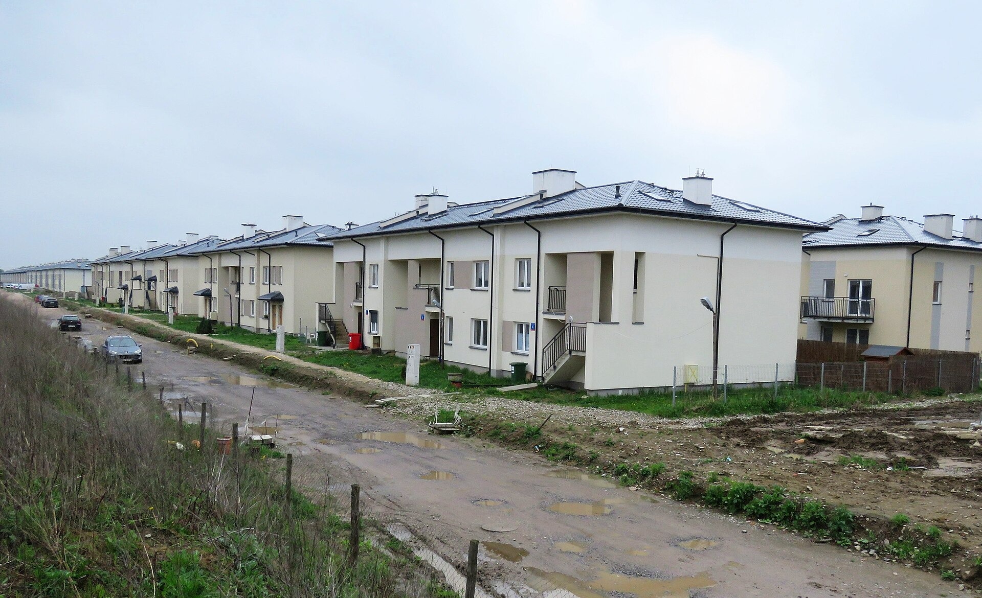 2013-2016 Osiedle domów jednorodzinnych 154 domy dwulokalowe w zabudowie szeregowej. Białołęka, Warszawa.