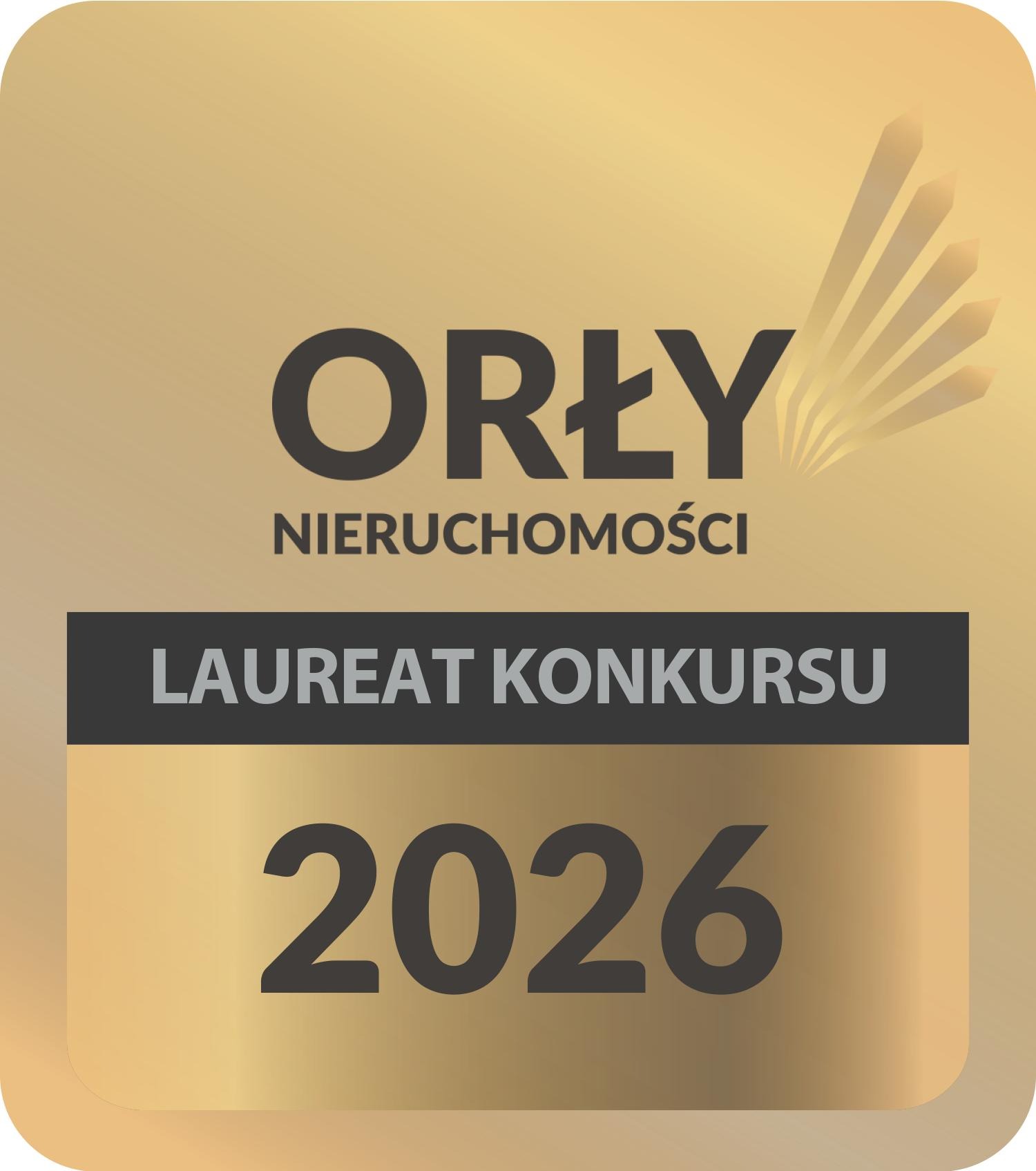 Złota odznaka 'Orły Nieruchomości' z napisem 'Laureat Konkursu 2026'. Symbol prestiżu i uznania w branży zarządzania nieruchomościami.