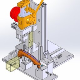 Firma Handlowo Usługowa SLIPPER Łukasz Zientkiewicz - Model 3D stanowiska testowego z uchwytem samochodowym, widok z góry. Elementy w kolorach: srebrny, pomarańczowy, czerwony. Projekt CAD/CAM/CAE.