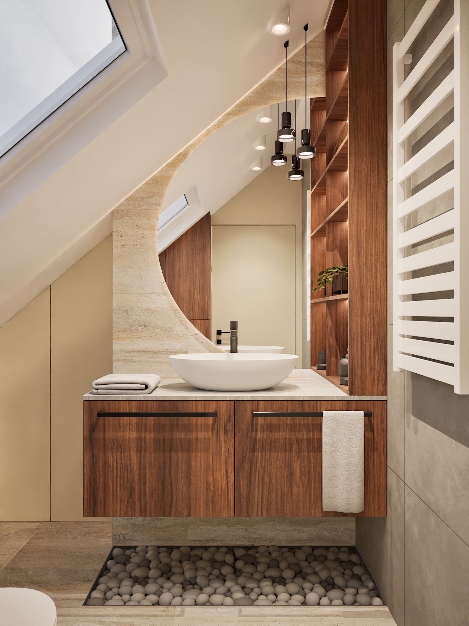 Nowoczesna łazienka na poddaszu z owalną umywalką, drewnianą szafką, lustrem z zaokrąglonym wycięciem i dekoracyjnymi kamieniami w podłodze.