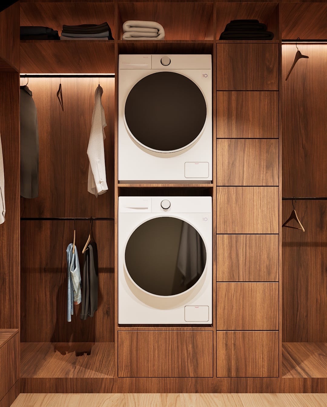 Drewniana garderoba z pralką i suszarką w zabudowie, oświetlenie LED, ubrania na wieszakach, złożone tekstylia na półkach. Minimalistyczny design, ciepłe światło.