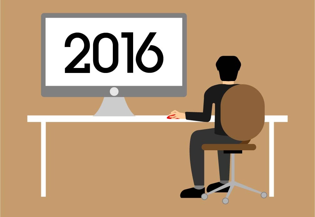 Grafik komputerowy w Opolu pracuje nad projektem z rokiem 2016 wyświetlonym na monitorze.