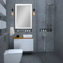 Nowoczesna łazienka z szarymi płytkami, białymi meblami, umywalką nablatową, wiszącą toaletą i szklaną kabiną prysznicową, oświetlona żarówkami Edisona.