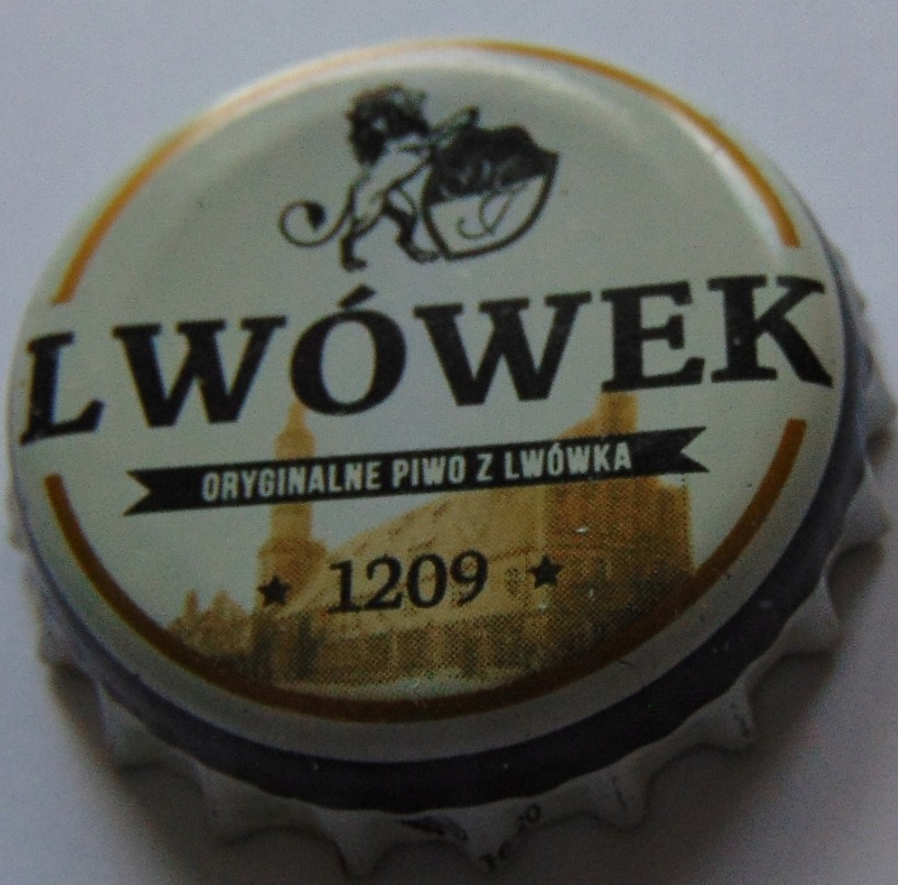Kapsel piwa Lwówek z motywem lwa i datą 1209, ukazujący markę i tradycję browaru.
