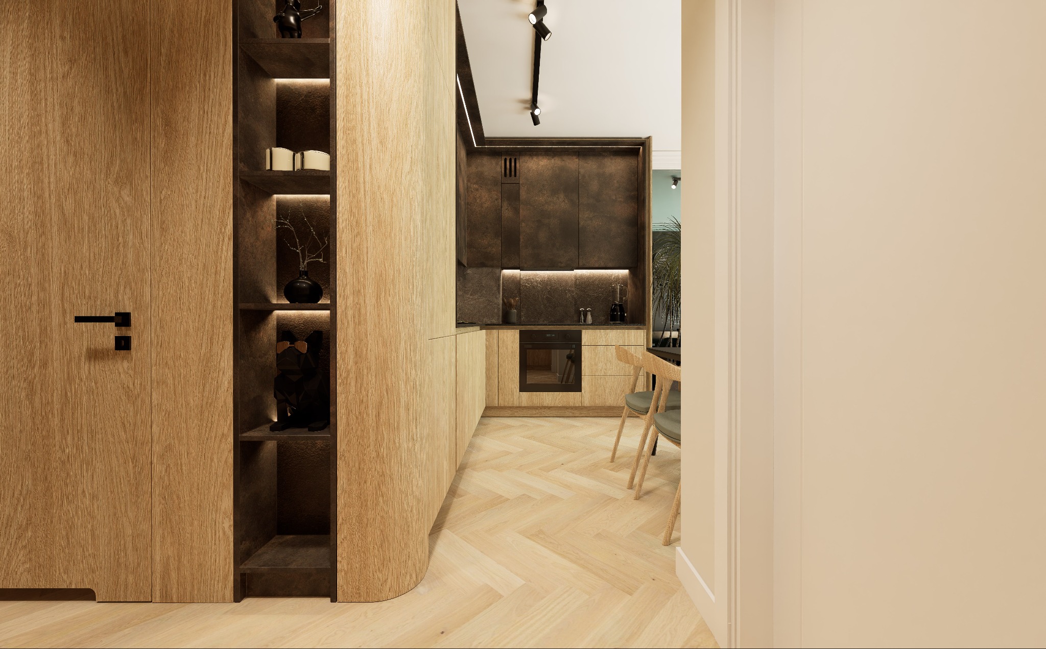 Nowoczesna kuchnia z drewnianymi frontami, oświetleniem punktowym i parkietem ułożonym w jodełkę, widok z korytarza przez otwarte drzwi.