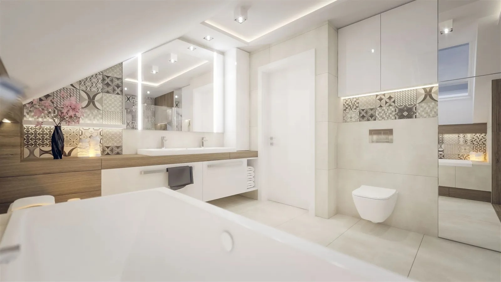 Jasna łazienka na poddaszu z patchworkowymi płytkami, białymi szafkami i wanną na pierwszym planie.