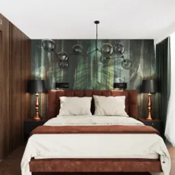 Sypialnia z łóżkiem z brązowym zagłówkiem, lampkami nocnymi z czarnymi abażurami i zieloną tapetą z motywem liści, oświetlona nowoczesną lampą sufitową.