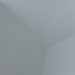 USŁUGI TYNKARSKO-BUDOWLANE - Wnętrze pomieszczenia z gładkimi, pomalowanymi na biało ścianami i sufitem, widok na narożnik z delikatnym oświetleniem padającym z góry.