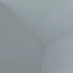 Wnętrze pomieszczenia z gładkimi, pomalowanymi na biało ścianami i sufitem, widok na narożnik z delikatnym oświetleniem padającym z góry.