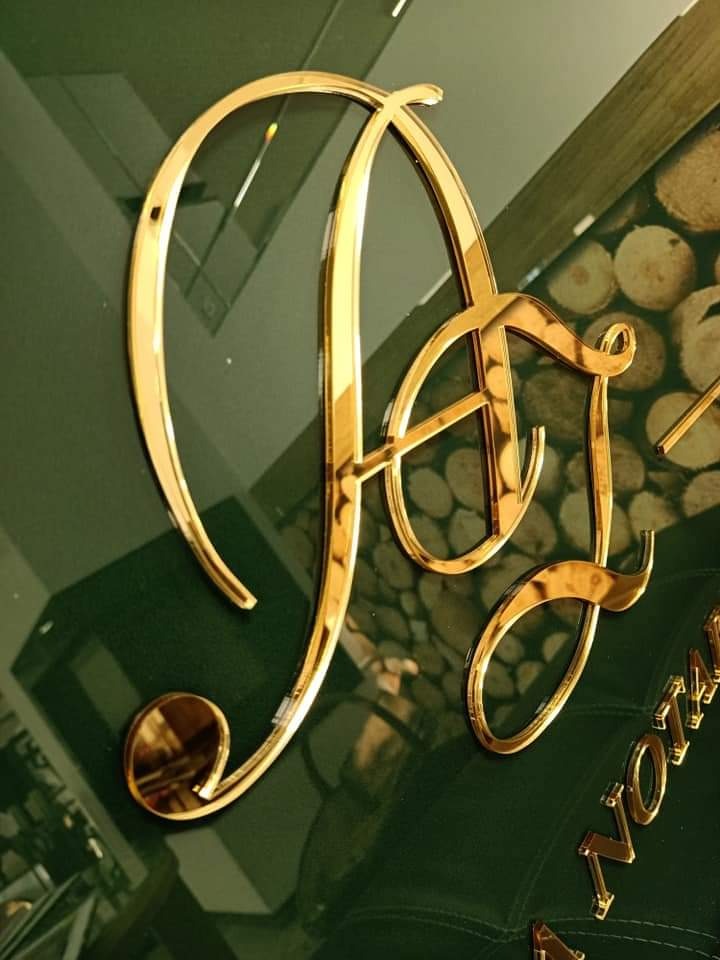 szyld - zielone szkło - złote litery