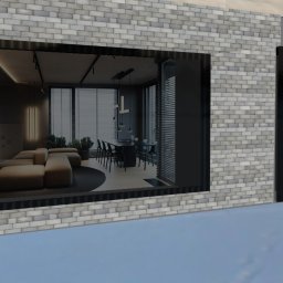 Karolina Sobczyk - Wnętrze nowoczesnego domu z salonem i jadalnią, widoczne przez duże okno z ceglaną ramą. Minimalistyczny design z beżową sofą modułową, czarnym dywanem i stołem jadalnym z krzesłami. Na ścianie...