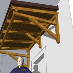 GuDREW - Wizualizacja 3D drewnianego zadaszenia nad wejściem do budynku z widoczną sylwetką człowieka dla skali i logo firmy w prawym dolnym rogu.