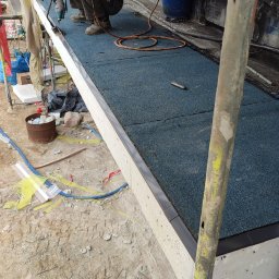 BUDWOKR Firma Budowlana Krzysztof Worzałła - Docieplenie, izolacja i obróbka blacharska daszku nad wjazdem do hali garażowej