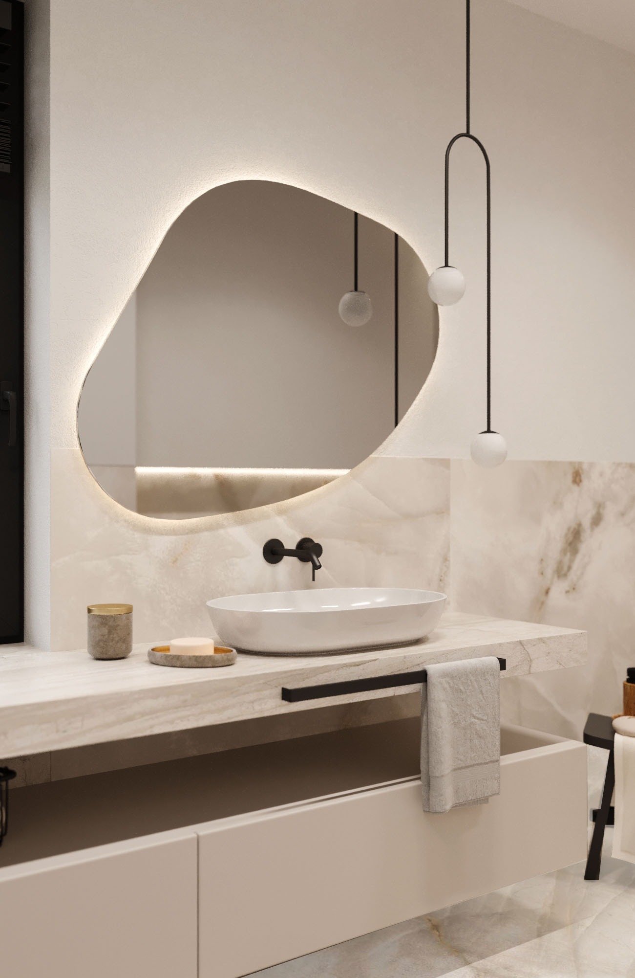 Nowoczesna łazienka z owalnym lustrem podświetlanym LED, białą umywalką nablatową, czarną armaturą i marmurowym blatem oraz wiszącą lampą z kulistymi kloszami.