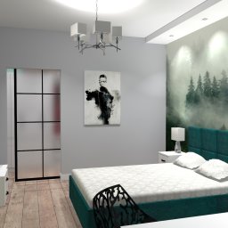 Ewelina Puk - Wizualizacja sypialni z łóżkiem z zielonym zagłówkiem, tapetą z motywem lasu we mgle, obrazem abstrakcyjnym i nowoczesną lampą wiszącą.