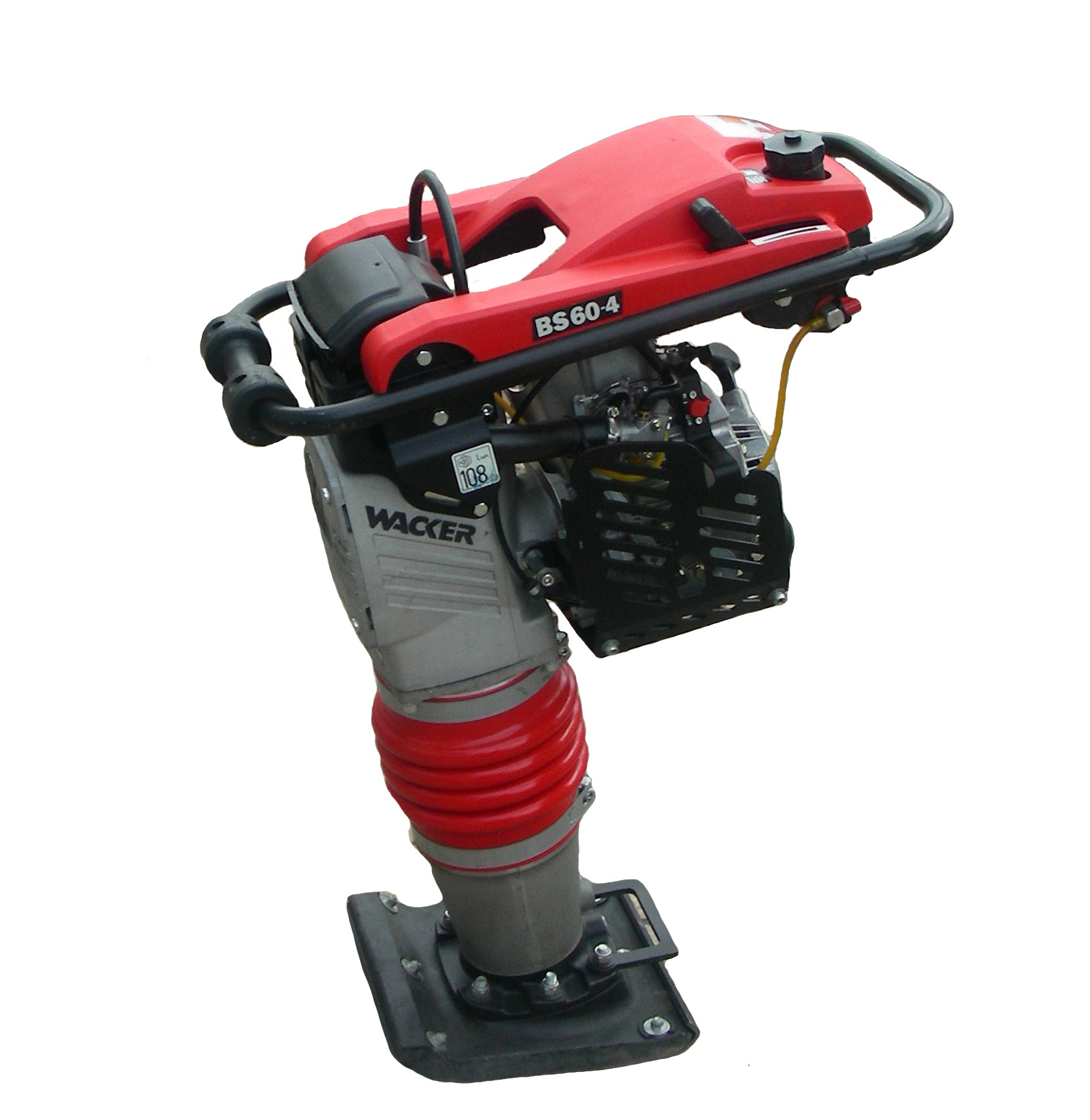 Zagęszczarka skoczek Wacker BS60-4, z silnikiem spalinowym, widok z boku, na białym tle, z widocznym logo i oznaczeniem modelu.