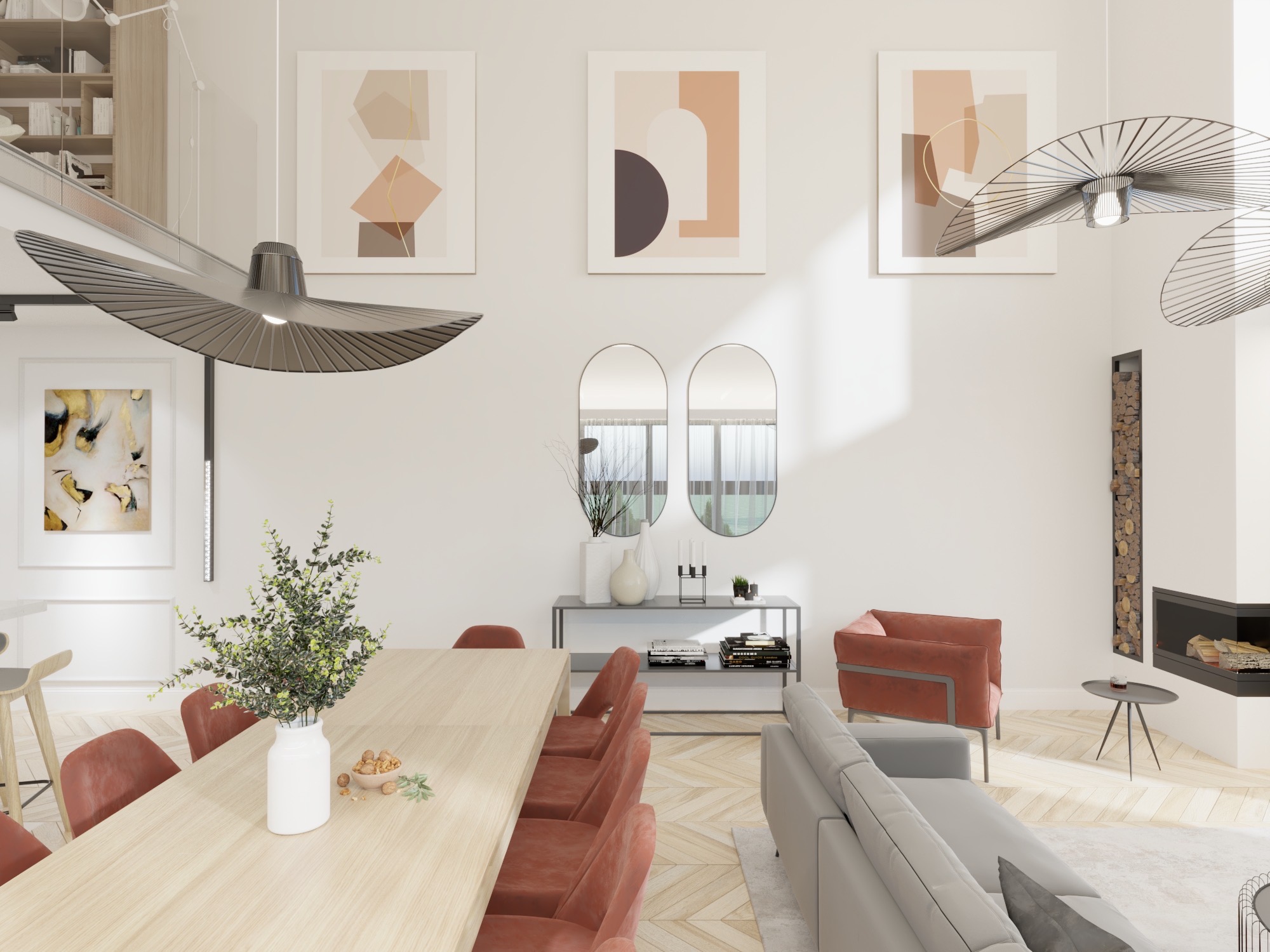 Jasne, przestronne wnętrze z drewnianą podłogą w jodełkę, dużym stołem z krzesłami w kolorze terakoty, szarą sofą, nowoczesnym kominkiem i abstrakcyjnymi obrazami na ścianie.