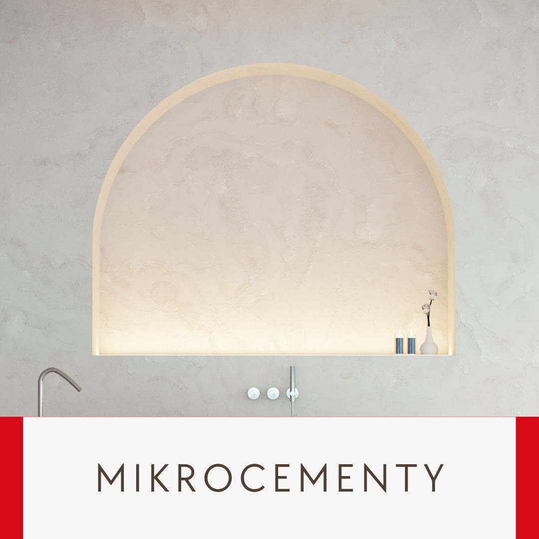 Ściana wykończona w odcieniach szarości z wnęką w kształcie łuku, podświetloną od dołu, z minimalistycznymi akcesoriami łazienkowymi i armaturą.