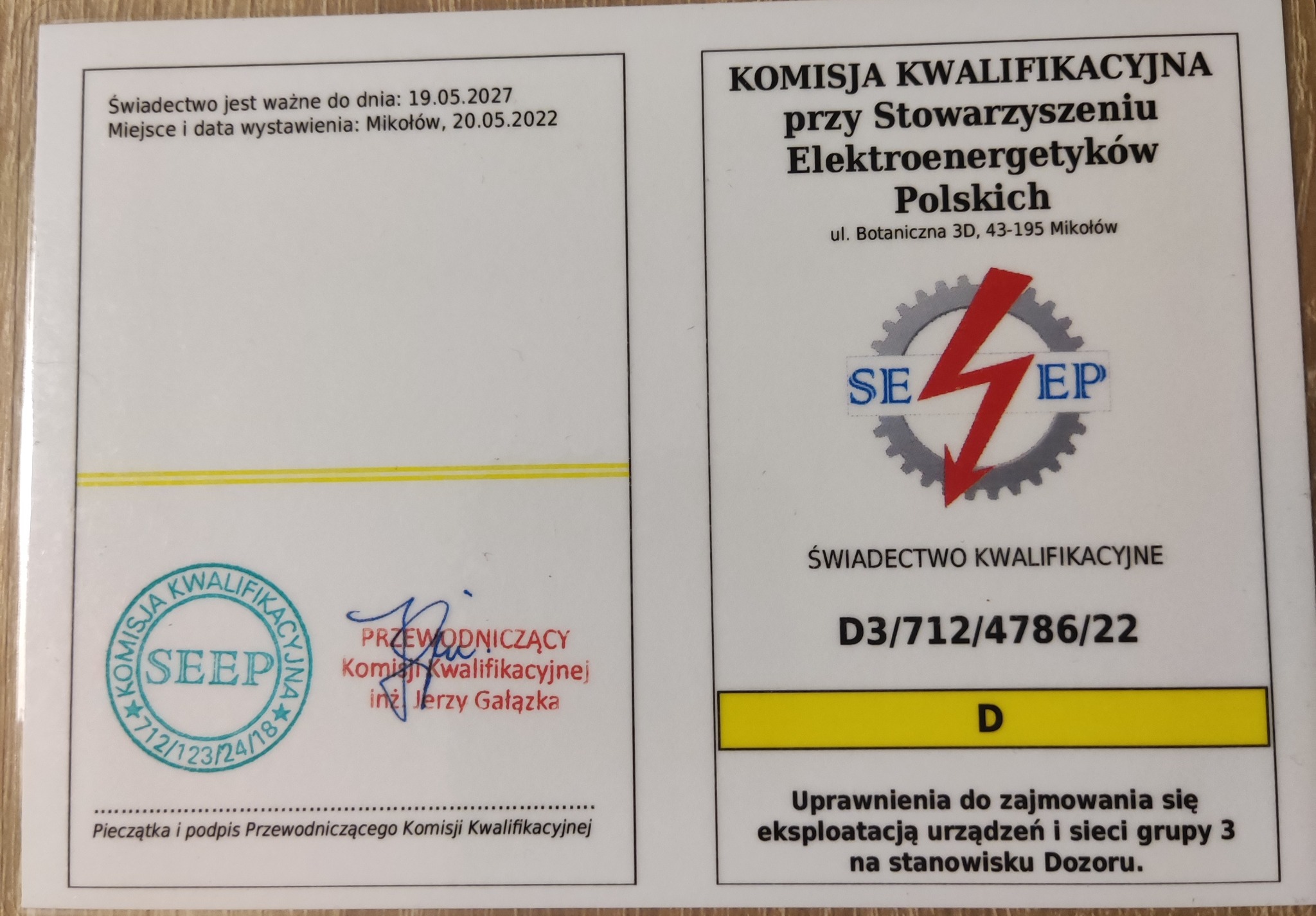 Skan świadectwa kwalifikacyjnego SEP z datą ważności do 19.05.2027, wydanego w Mikołowie, z widocznym logo SEP (Stowarzyszenia Elektryków Polskich) i pieczątką Komisji Kwalifikacyjnej.