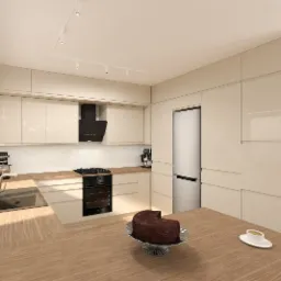 Jasna, nowoczesna kuchnia z beżowymi, lakierowanymi frontami, drewnianym blatem, czarnym okapem i srebrną lodówką; na stole kawa i czekoladowe ciasto.