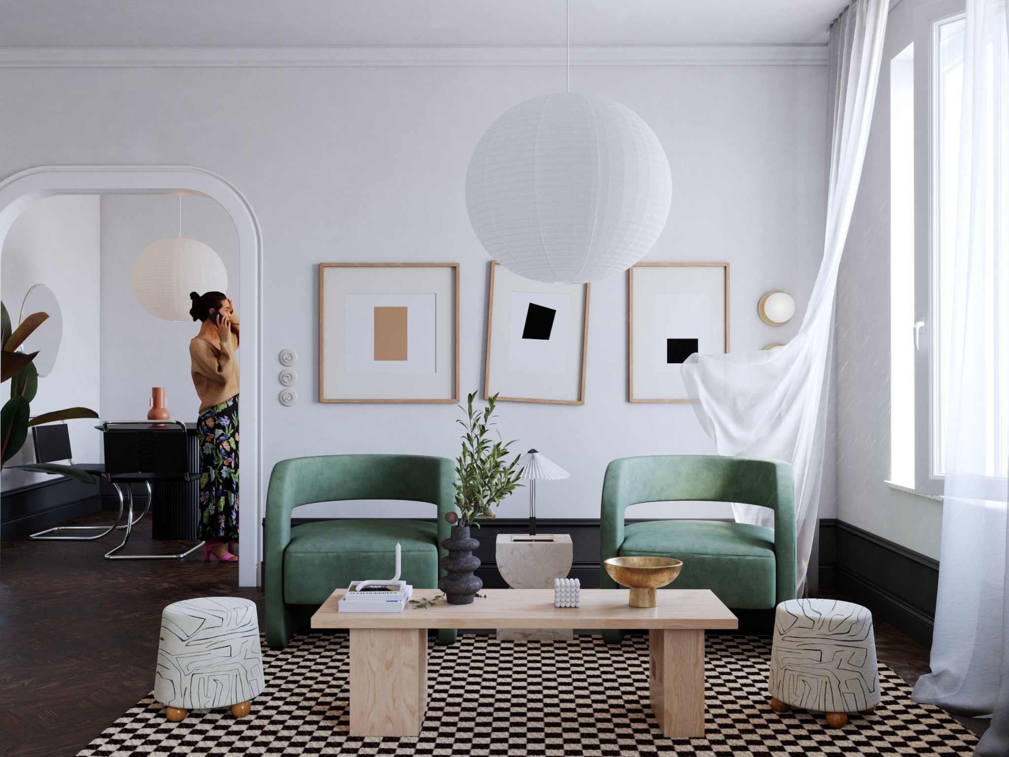 Jasne wnętrze z zielonymi fotelami, drewnianym stolikiem kawowym i geometrycznym dywanem w szachownicę, uzupełnione przez dekoracje i osobę rozmawiającą przez telefon w tle.