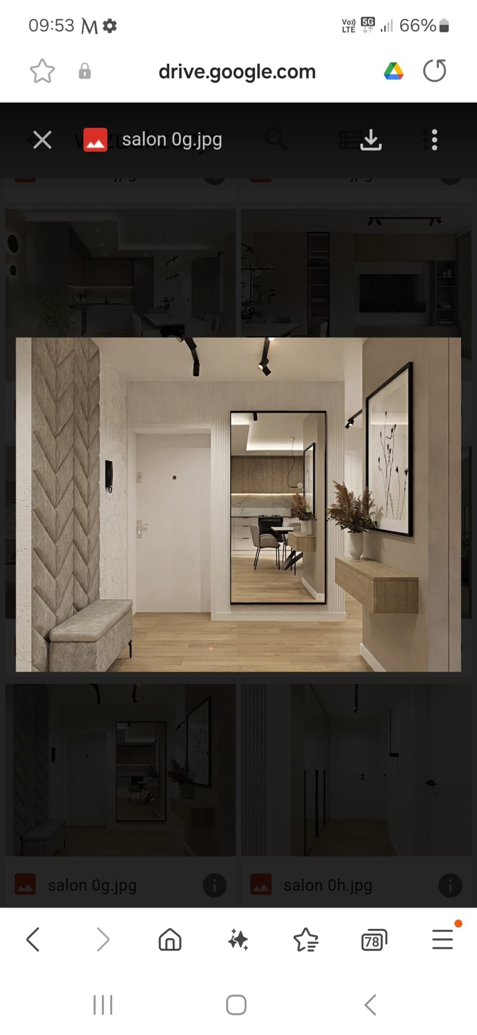 Nowoczesny przedpokój z tapicerowanym panelem ściennym w jodełkę, lustrem w czarnej ramie odbijającym kuchnię i drewnianą konsolą z dekoracyjną trawą.