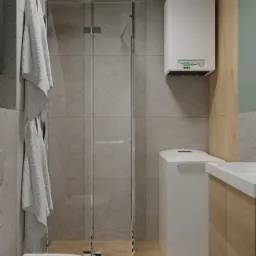 Nowoczesna łazienka z kabiną prysznicową typu walk-in, wiszącą toaletą, umywalką z szafką z drewnianymi frontami, grzejnikiem oraz geometryczną podłogą w czarno-białe romby.