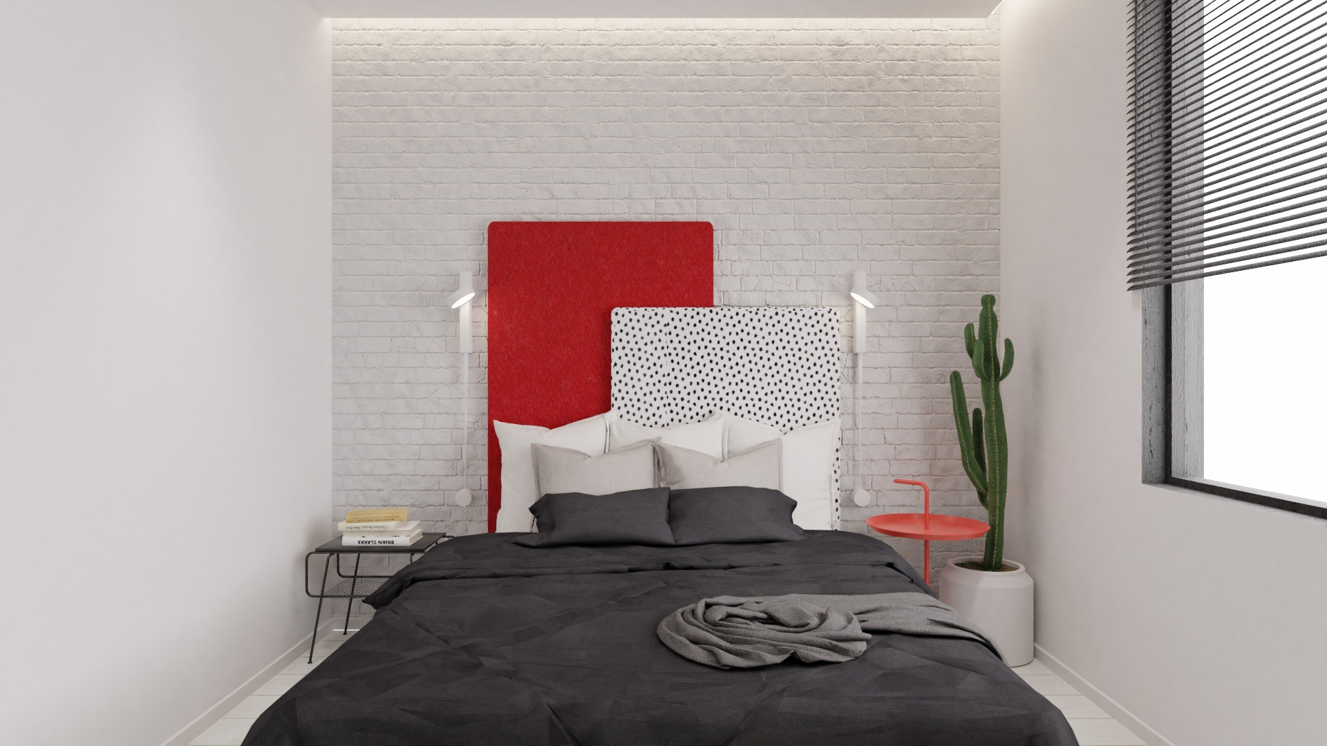 Nowoczesna sypialnia z ceglaną ścianą, asymetrycznymi zagłówkami w kolorze czerwonym i w kropki, czarną pościelą, kaktusem i minimalistycznym oświetleniem.