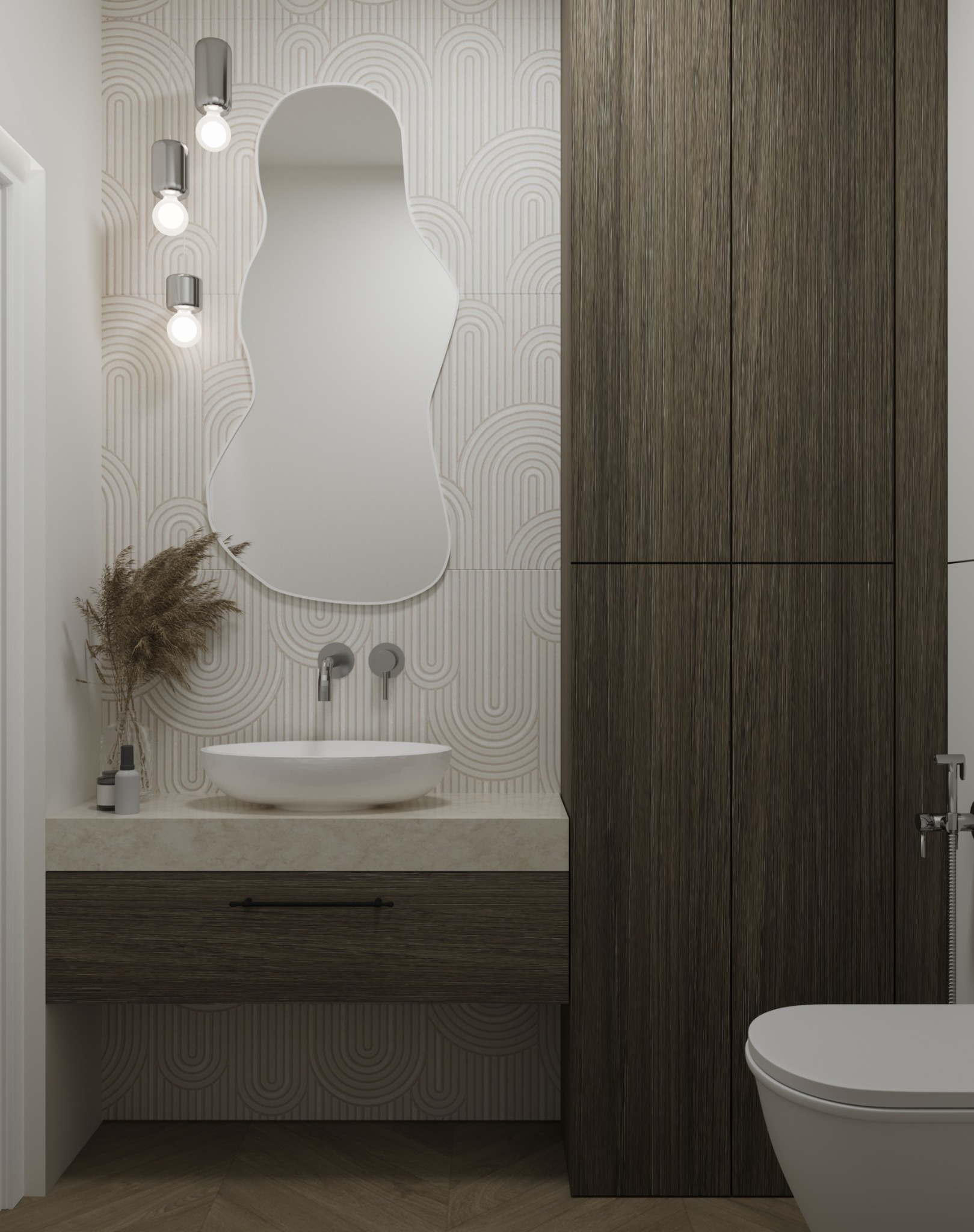 Nowoczesna łazienka z umywalką nablatową, asymetrycznym lustrem, lampami punktowymi i drewnianą szafką z szufladą, uzupełniona dekoracyjną trawą pampasową w wazonie.
