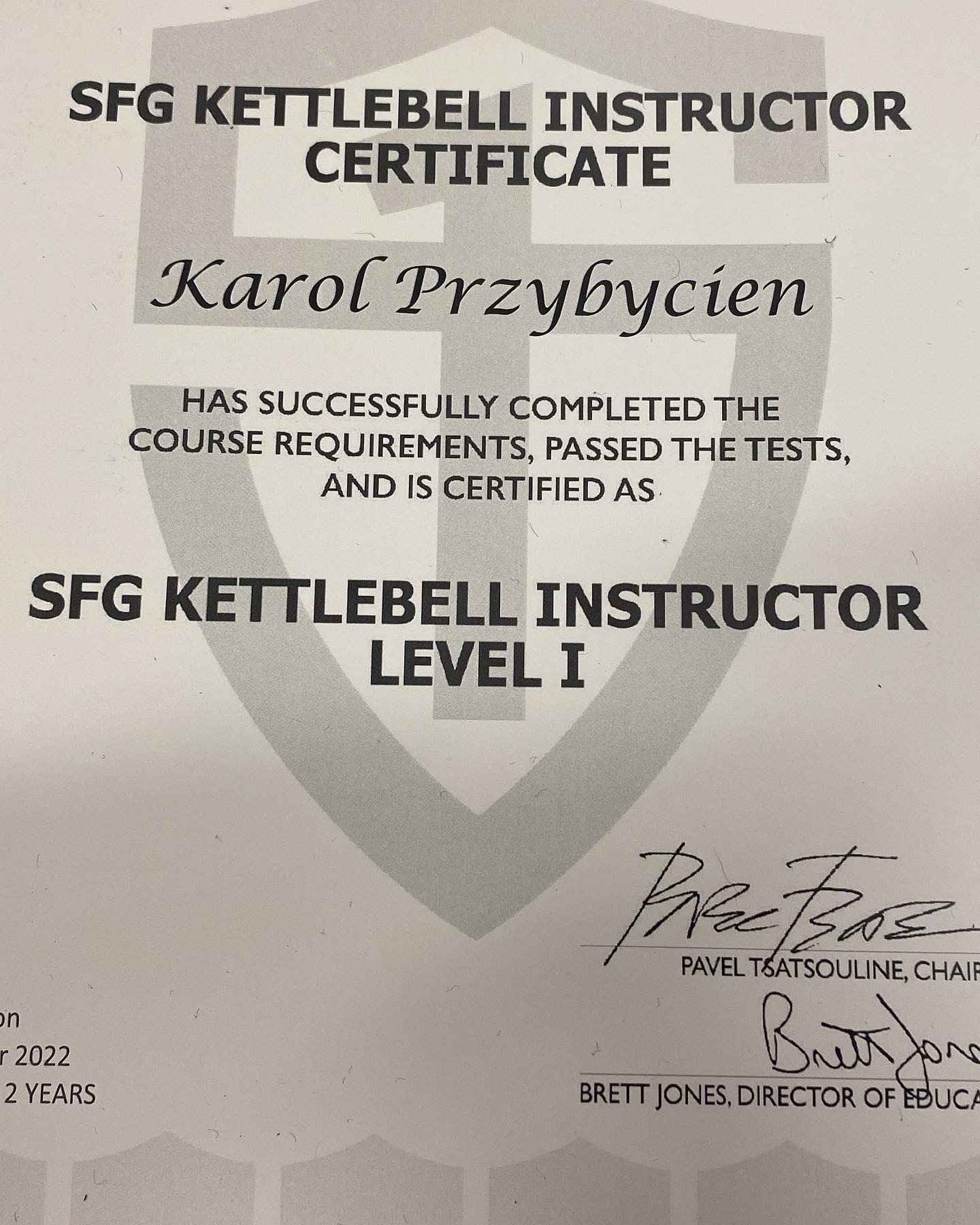 Certyfikat SFG Kettlebell Instructor Level I na nazwisko Karol Przybycien, podpisany przez Pavel Tsatsouline i Brett Jones.