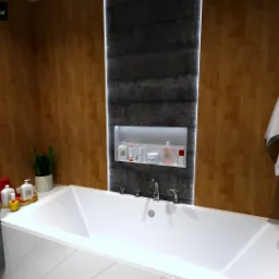 Nowoczesna łazienka z wanną, umywalką z szafką w odcieniach szarości, drewnianą okładziną ścian, dekoracyjną wnęką z kosmetykami i wiszącymi ręcznikami.