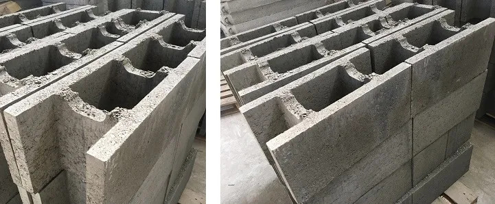 Szare bloczki betonowe z otworami ułożone w stosy na palecie, widoczne niedoskonałości odlewu.