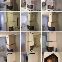 Kominek narożny w trakcie budowy, obudowany płytami gipsowo-kartonowymi, widoczne etapy wykończenia i ogień w palenisku.