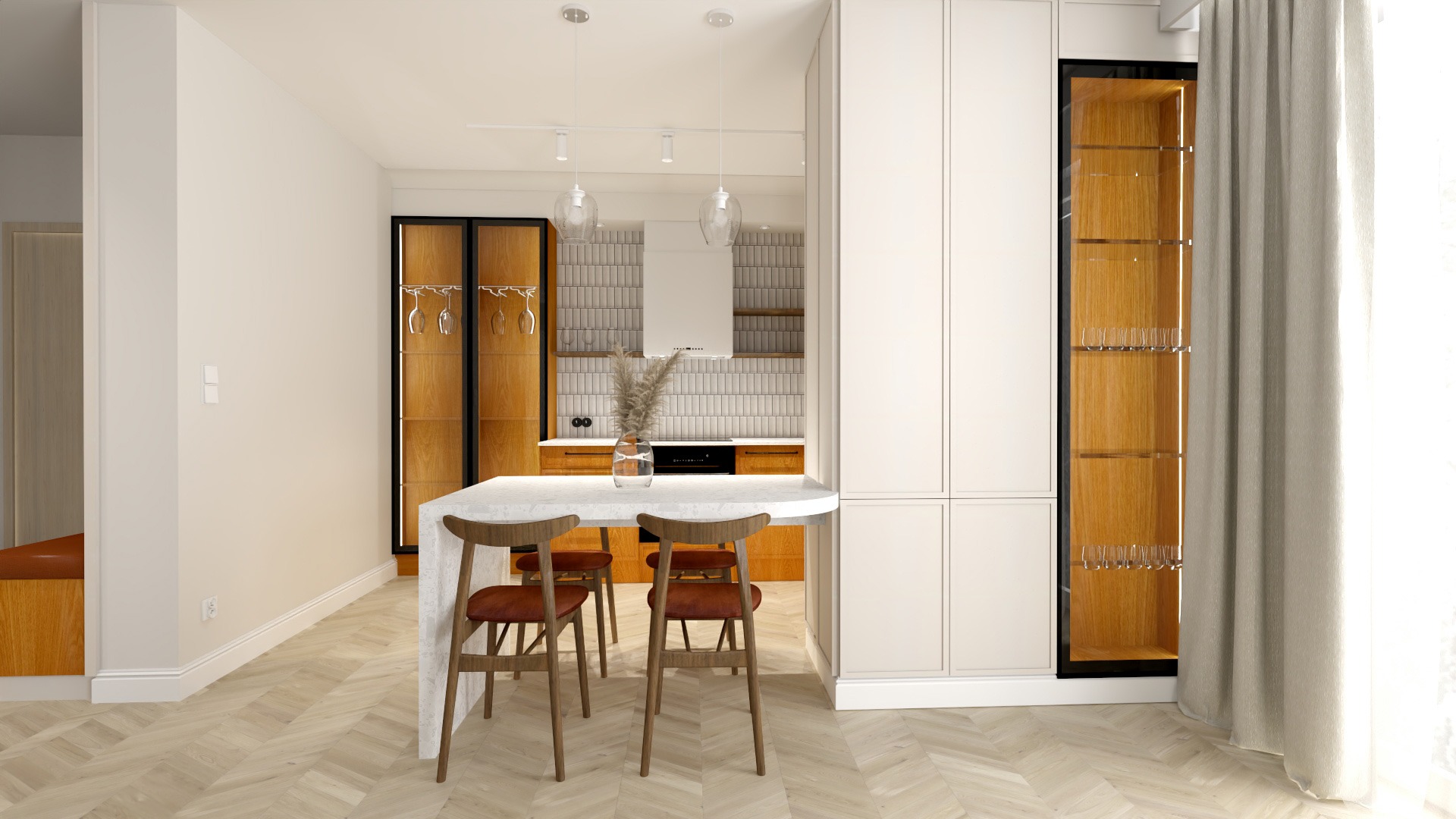 Jasne mieszkanie z aneksem kuchennym, drewniane szafki z ekspozycją na szkło, wyspa z blatem z konglomeratu i krzesłami, parkiet w jodełkę, dekoracyjna trawa w wazonie.