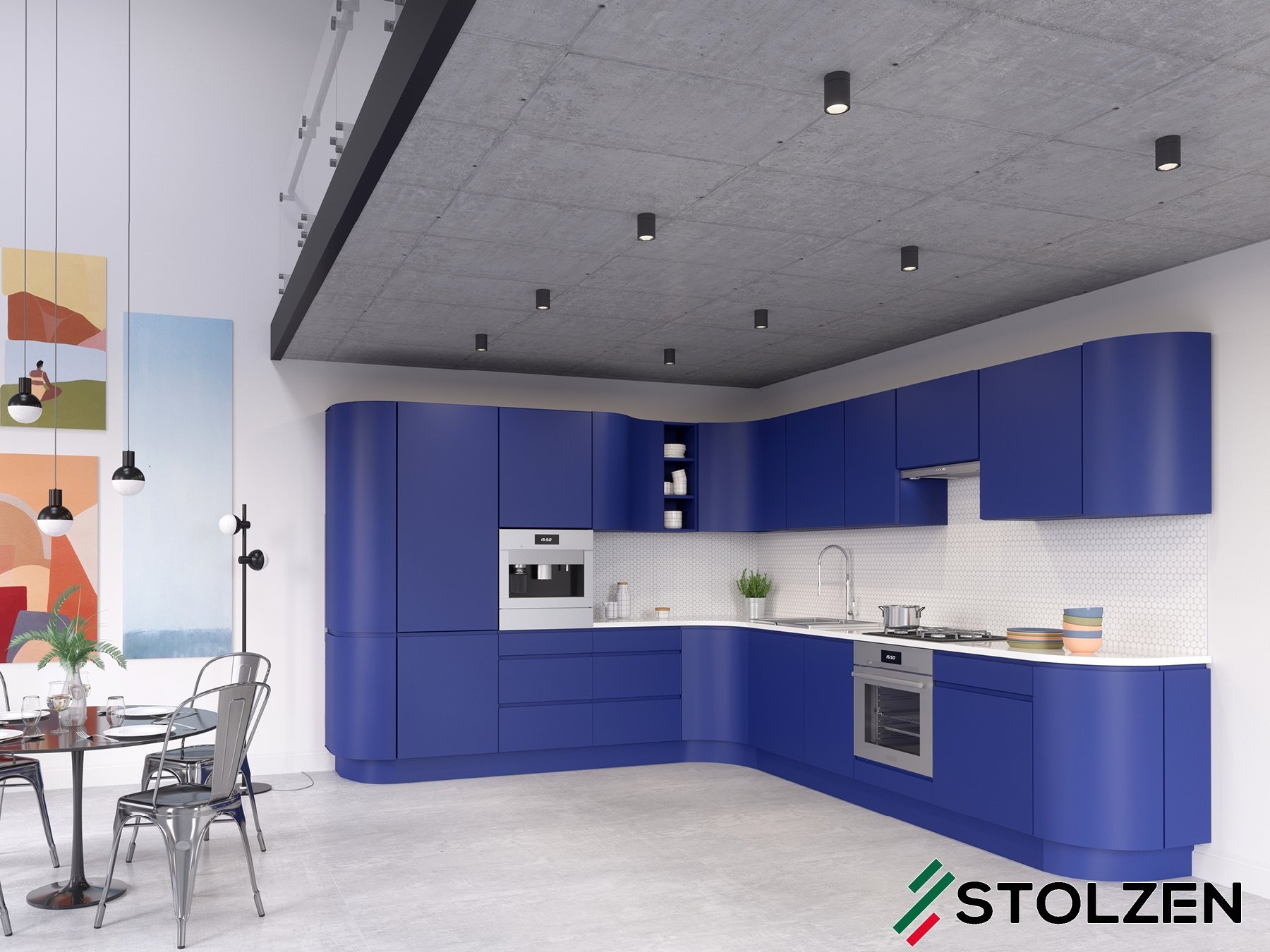 Nowoczesna, niebieska zabudowa kuchenna z zaokrąglonymi frontami, jasnym blatem i heksagonalną mozaiką na ścianie, uzupełniona o stół z metalowymi krzesłami i abstrakcyjne obrazy.
