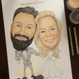 Ręcznie rysowana karykatura ślubna pary, Pauliny i Kamila, z datą 26.02.2022, z pastelami i ołówkami obok.