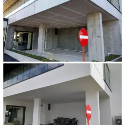 Dwa ujęcia elewacji budynku: górne przedstawia surowy stan z widocznymi płytami GK na podbitce, dolne ukazuje elewację po malowaniu na biało, z charakterystycznym znakiem zakazu w obu kadrach.