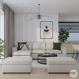 Jasny salon z narożną sofą, pufami, okrągłym stolikiem kawowym, modernistyczną lampą i abstrakcyjnym obrazem na ścianie z delikatną sztukaterią.