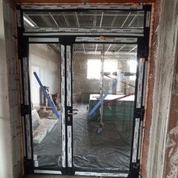 KAMBUD Kamil Laskowski - montaż drzwi aluminiowych