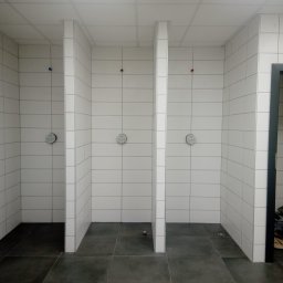 A.S.Bud Oleksandr Sokhmii - Biuro DHL we Wrocławiu. Płytki na podłodze 60*60, płytki na ścianie 20*60