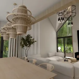 Jasne, przestronne wnętrze z dużym stołem, rattanowymi lampami i kominkiem. Minimalistyczny design z naturalnymi akcentami i widokiem na zieleń.