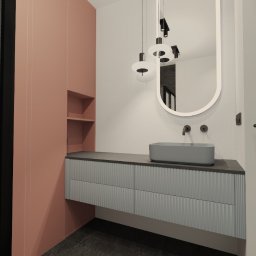 COLIBRIART PRACOWNIA WNĘTRZ EWA ŚWIDERSKA-BASIAK - Wizualizacja łazienki z umywalką nablatową, lustrem owalnym i szafką z ryflowanym frontem. Uwagę zwraca kolorystyka: pudrowy róż i szaro-błękitne odcienie.