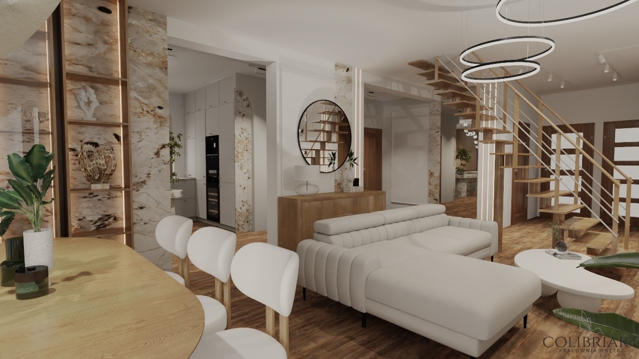 Jasne wnętrze z drewnianymi schodami i marmurową ścianą. Nowoczesny design z okrągłym lustrem i białymi krzesłami. Oświetlenie LED dodaje elegancji.