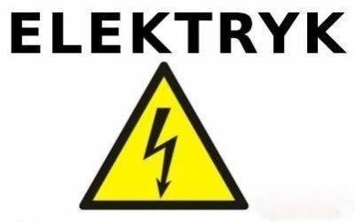 Znak ostrzegawczy z symbolem błyskawicy w żółtym trójkącie i napisem ELEKTRYK powyżej.