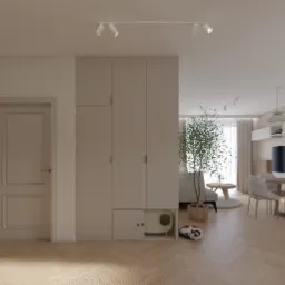 Jasne, przestronne wnętrze mieszkania z parkietem w jodełkę, beżowymi drzwiami i szafą z ukrytą kuwetą dla kota, widok na salon z telewizorem i jadalnię z wyspą kuchenną.
