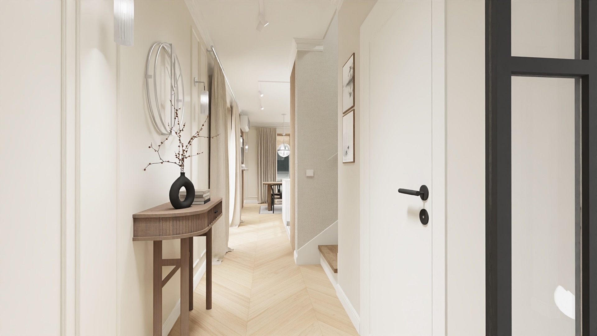Korytarz w jasnych barwach z parkietem ułożonym w jodełkę, konsola z czarnym wazonem i suchymi gałązkami, okrągłe lustro na ścianie, drzwi z czarną klamką i przeszklona ściana działowa.